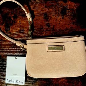 Calvin Klein wristlet 4” x6.5” light pink